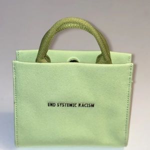 Brandon Blackwood green End Systemic Racism purse